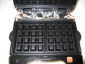 お餅がマシンのちょうつがい部分にどっちゃり お餅がマシンのちょうつがい部分にどっちゃり